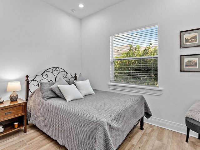 bedroom featuring light wood-type flooring