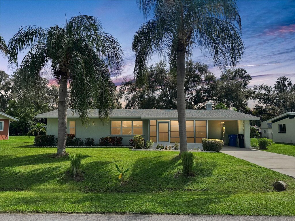 view of front of house with a lawn