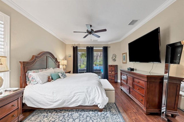 bedroom with crown molding, ceiling fan, and dark hardwood / wood-style floors