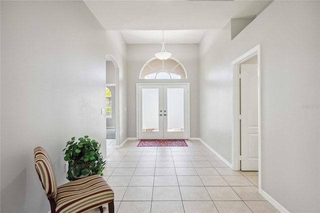 tiled foyer with french doors