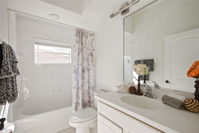 full bathroom featuring vanity, shower / tub combo with curtain, and toilet