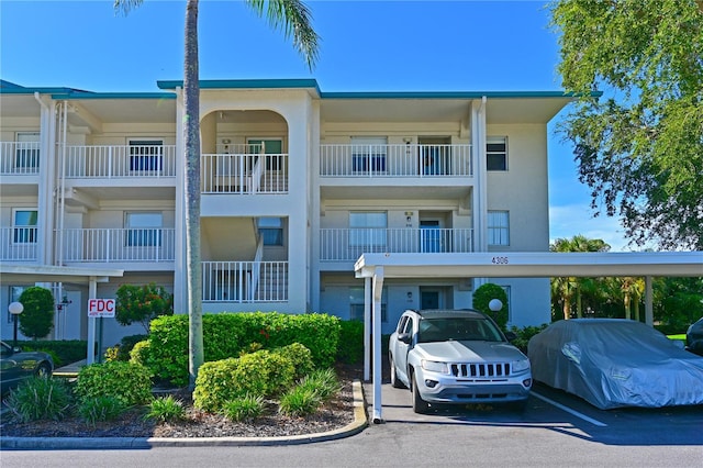 view of property with a carport