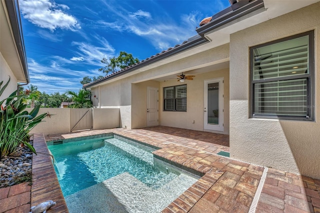 view of pool featuring a patio area and ceiling fan