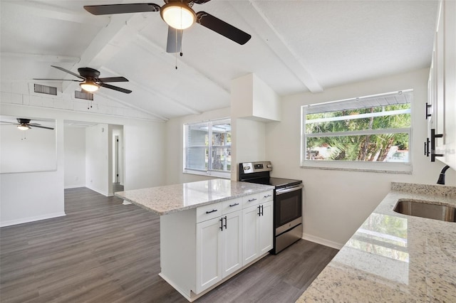 kitchen with white cabinets, light stone countertops, stainless steel range with electric stovetop, dark wood-type flooring, and ceiling fan