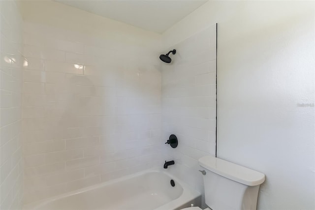 full bathroom featuring tub / shower combination and toilet