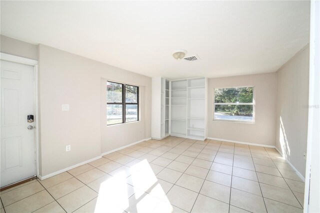 view of tiled spare room