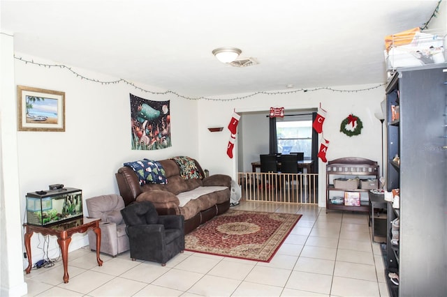 living room featuring light tile patterned flooring