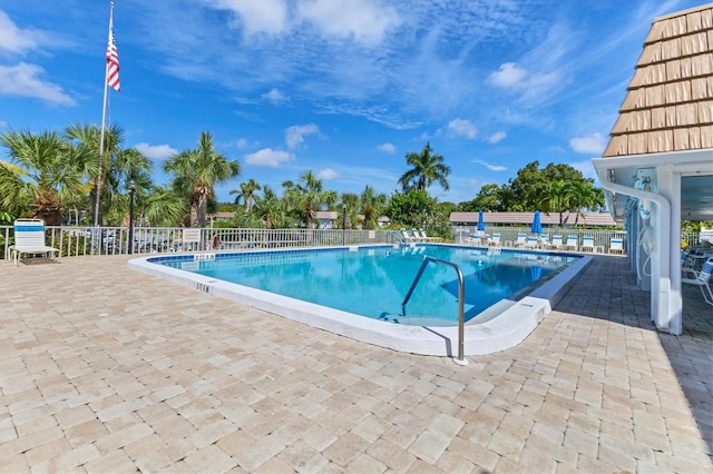 view of swimming pool with a patio area