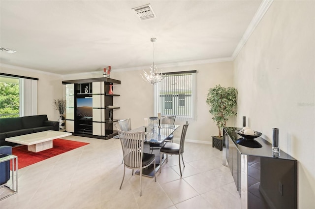 dining room with a chandelier, visible vents, crown molding, and light tile patterned floors