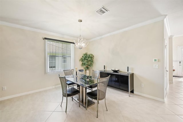 dining room featuring ornamental molding, light tile patterned flooring, visible vents, and baseboards