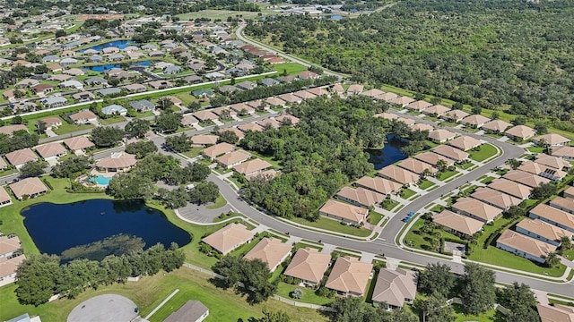 bird's eye view featuring a water view and a residential view