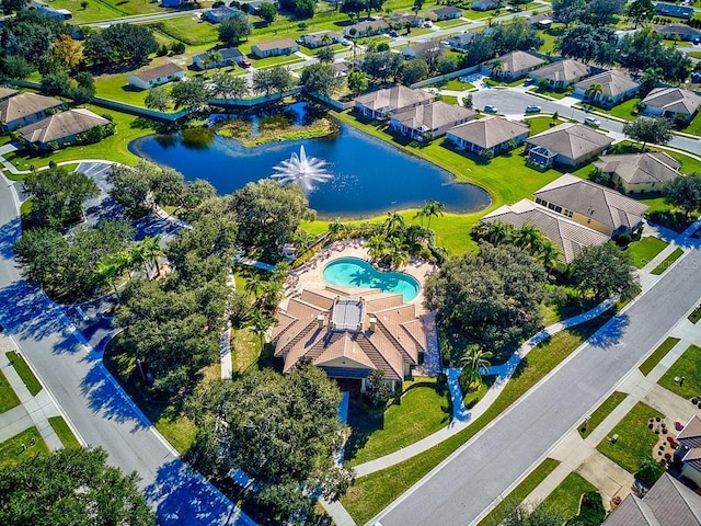 bird's eye view with a water view and a residential view