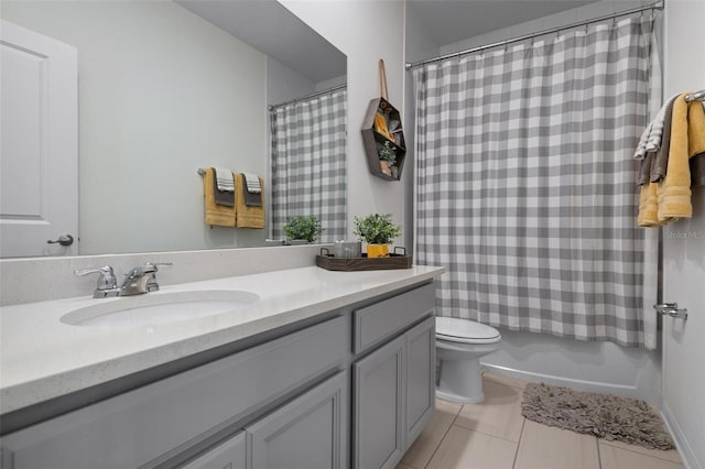 full bathroom featuring tile patterned flooring, vanity, toilet, and shower / tub combo