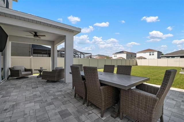 view of patio / terrace featuring ceiling fan