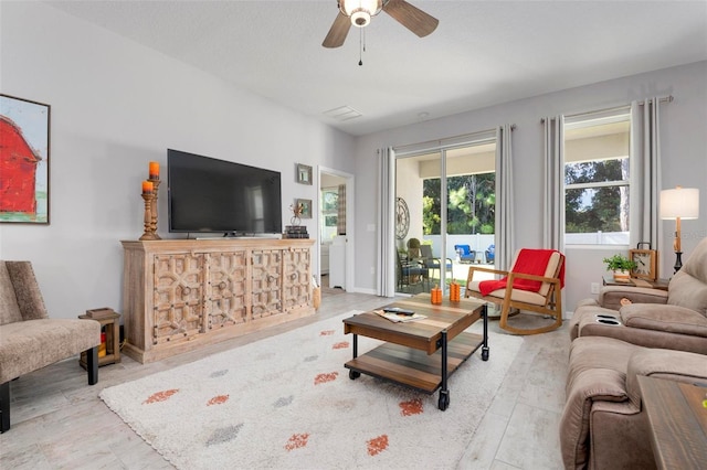 living room with ceiling fan