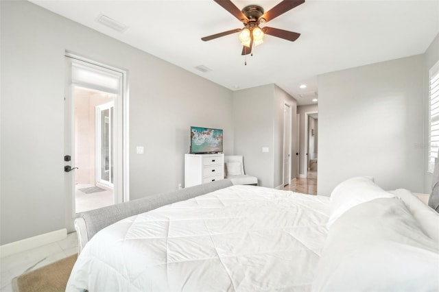 bedroom featuring ceiling fan and light colored carpet