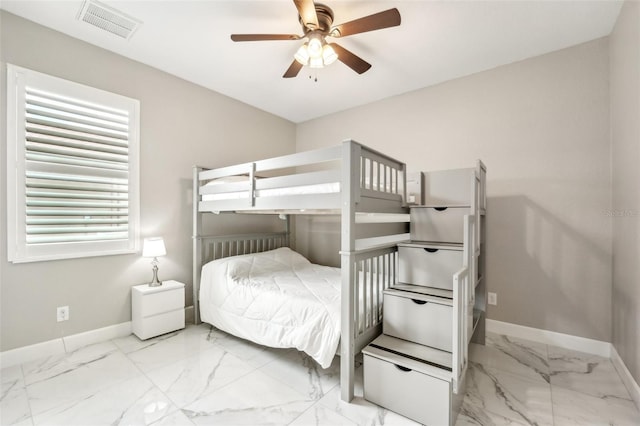 bedroom featuring ceiling fan