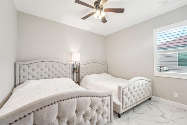 bedroom featuring ceiling fan