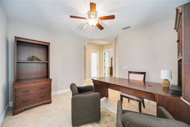 office featuring light tile patterned flooring and ceiling fan