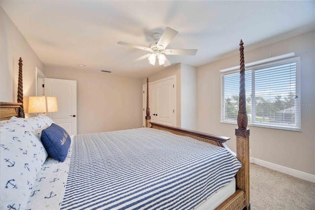 bedroom with ceiling fan and carpet floors