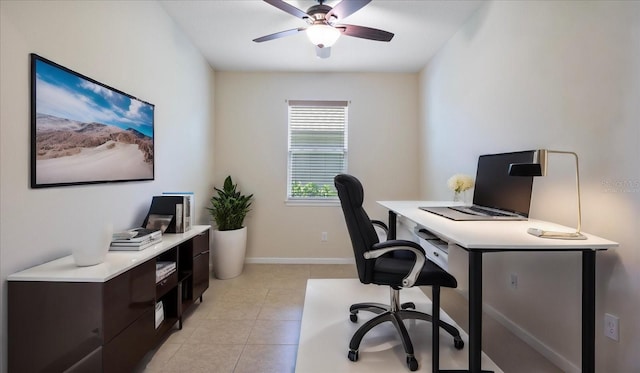 office space with ceiling fan and light tile patterned floors