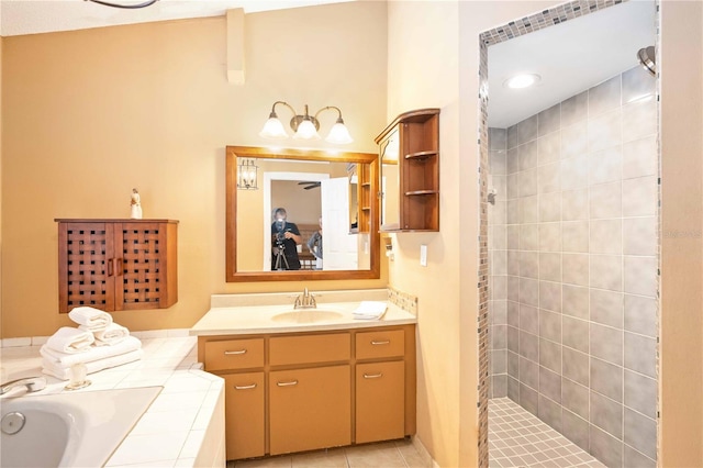 bathroom with vanity, independent shower and bath, and tile patterned floors