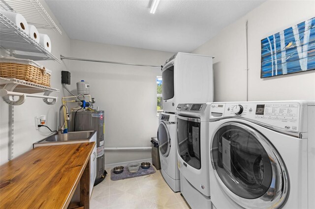 laundry room with sink and independent washer and dryer