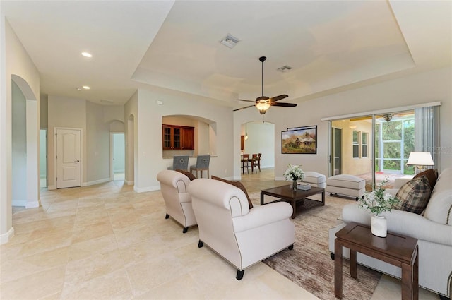 living room featuring ceiling fan