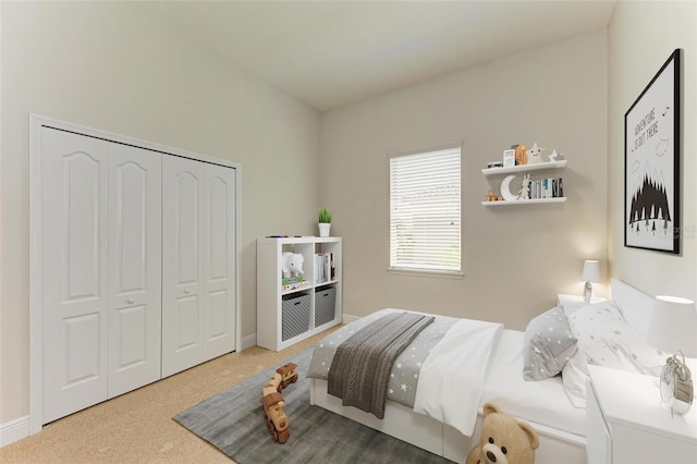 bedroom featuring a closet and carpet floors