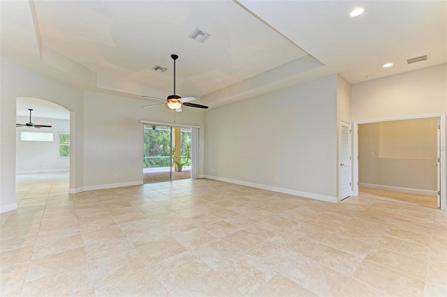 spare room with ceiling fan