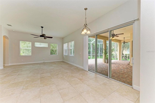 empty room featuring ceiling fan and light tile patterned floors