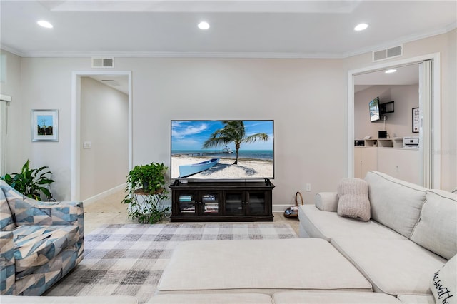 living room with crown molding and light carpet