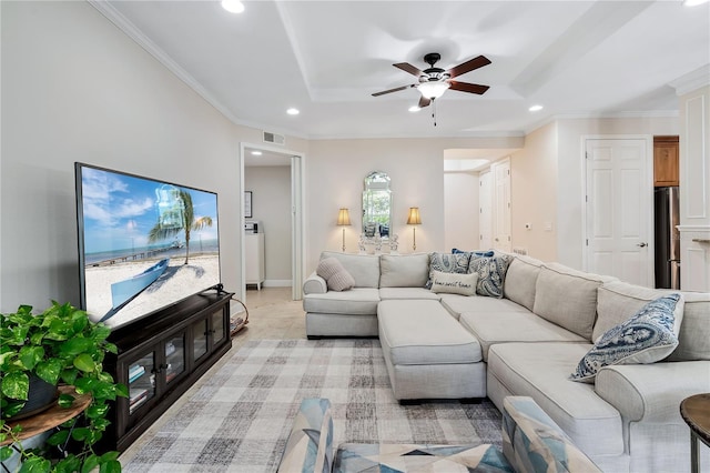 carpeted living room with ceiling fan and crown molding