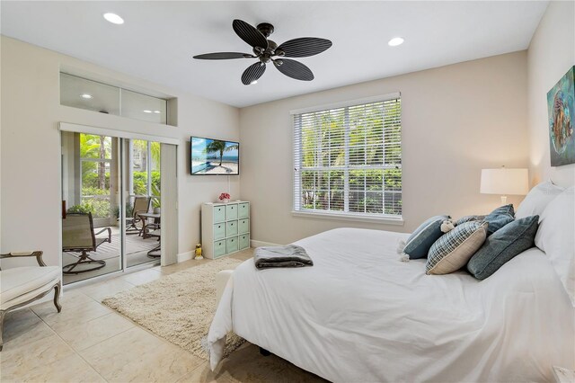 bedroom with ceiling fan, light tile patterned floors, and access to outside