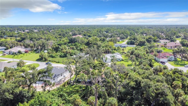 bird's eye view with a residential view and a forest view