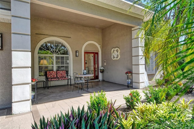 doorway to property featuring a patio