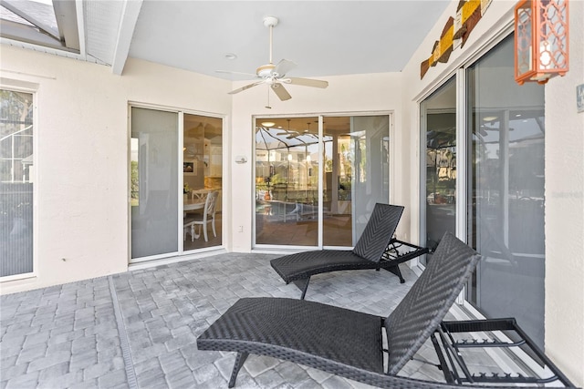 view of patio / terrace featuring ceiling fan