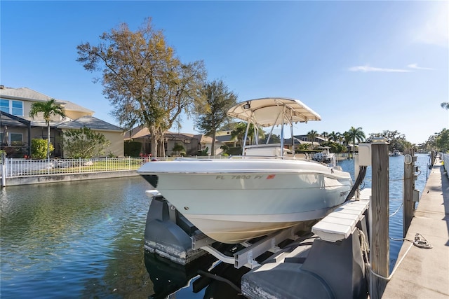 dock area featuring a water view