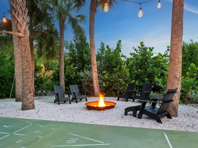 exterior space with a fire pit