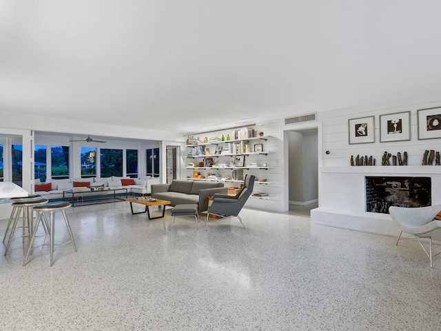 living room with ceiling fan