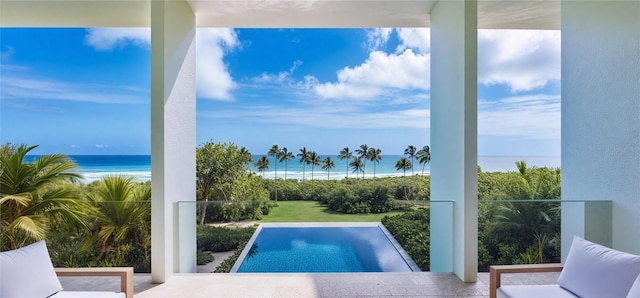 view of pool featuring a water view