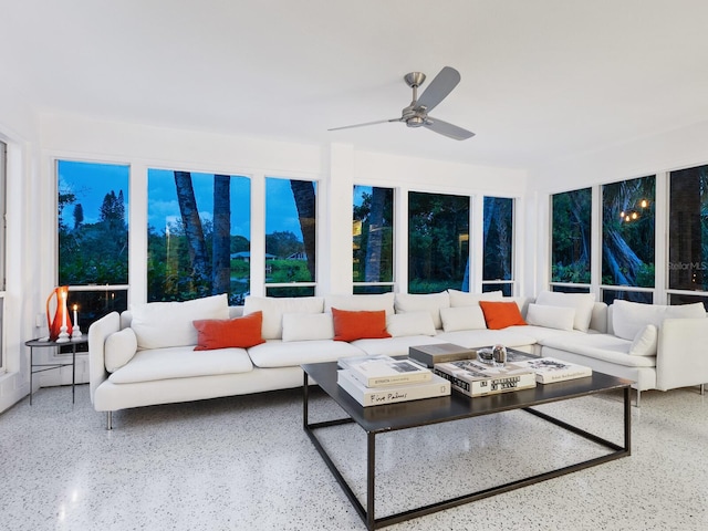 7665 Sanderling Rd, Sarasota, FL 34242 - living area with ceiling fan and speckle patterned floor