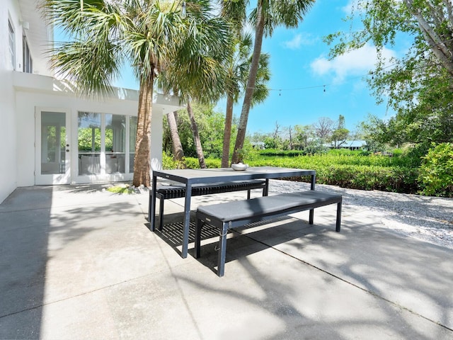 7665 Sanderling Rd, Sarasota, FL 34242 - view of patio featuring outdoor dining area