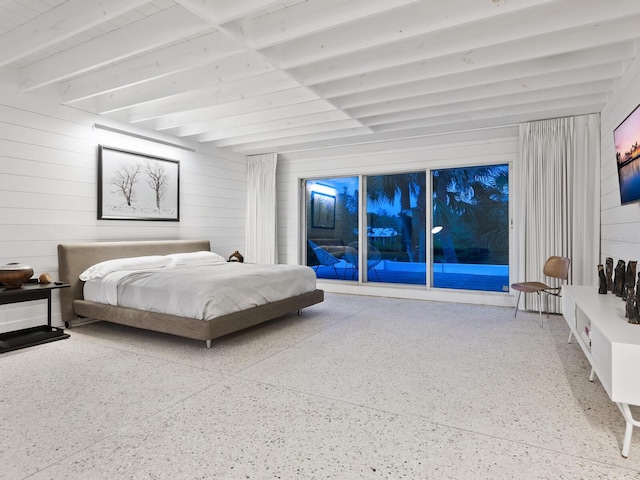 7665 Sanderling Rd, Sarasota, FL 34242 - bedroom with beamed ceiling, speckled floor, access to exterior, and wood walls