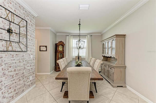 tiled dining space with crown molding and brick wall