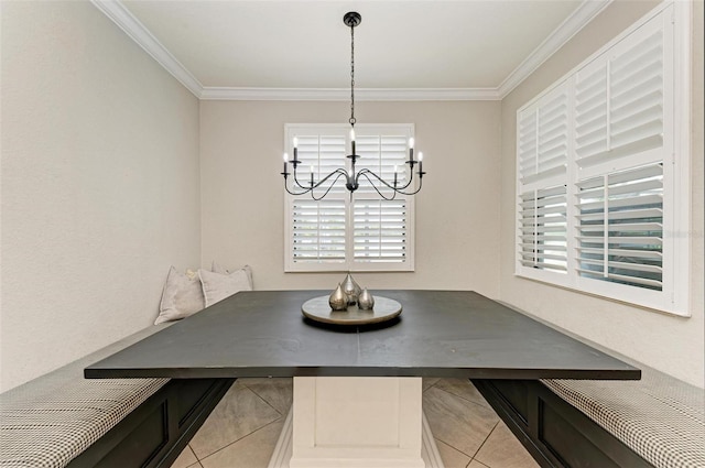 dining area with light tile patterned floors, an inviting chandelier, and ornamental molding