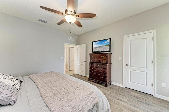 bedroom featuring ceiling fan and light hardwood / wood-style floors