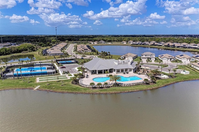 birds eye view of property featuring a water view