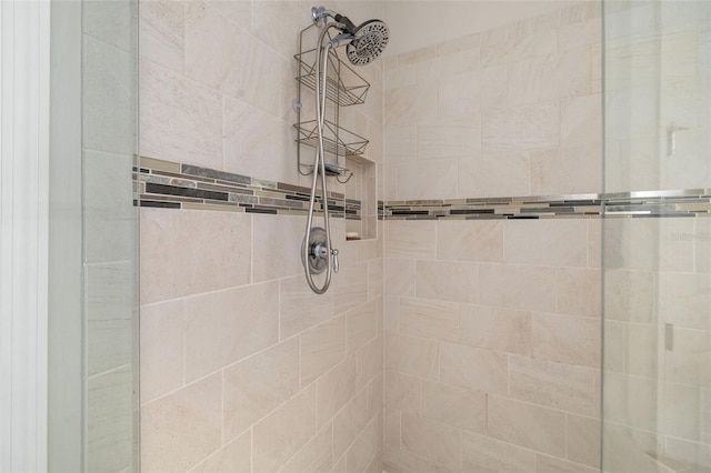 bathroom featuring an enclosed shower