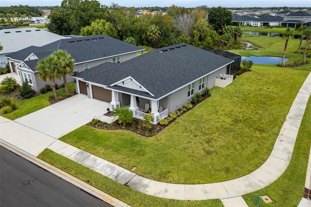 drone / aerial view featuring a water view